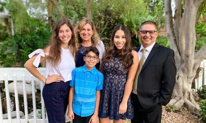 Casey Diaz (R) with his wife Sana and three children.