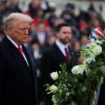 Trump and Vance attend a wreath-laying ceremony at Arlington National Cemetery on Sunday. Carlos Barria/Reuters