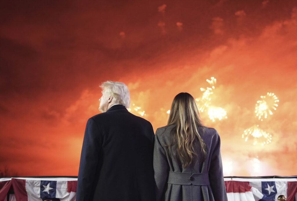 Donald and Melania Trump watch fireworks at the Trump National Golf Club in Sterling, Virginia, on Saturday, January 18. Alex Brandon/Pool/AP